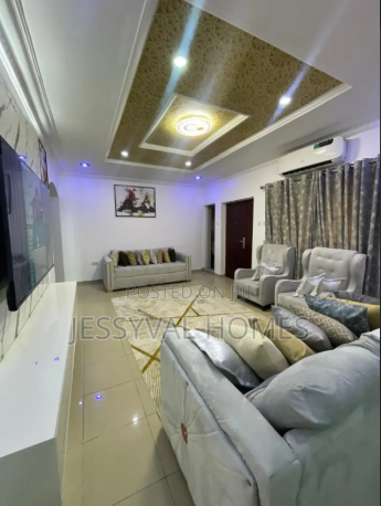 Spacious shortlet apartment living room suitable for family or team stays managed by AstroHomes.